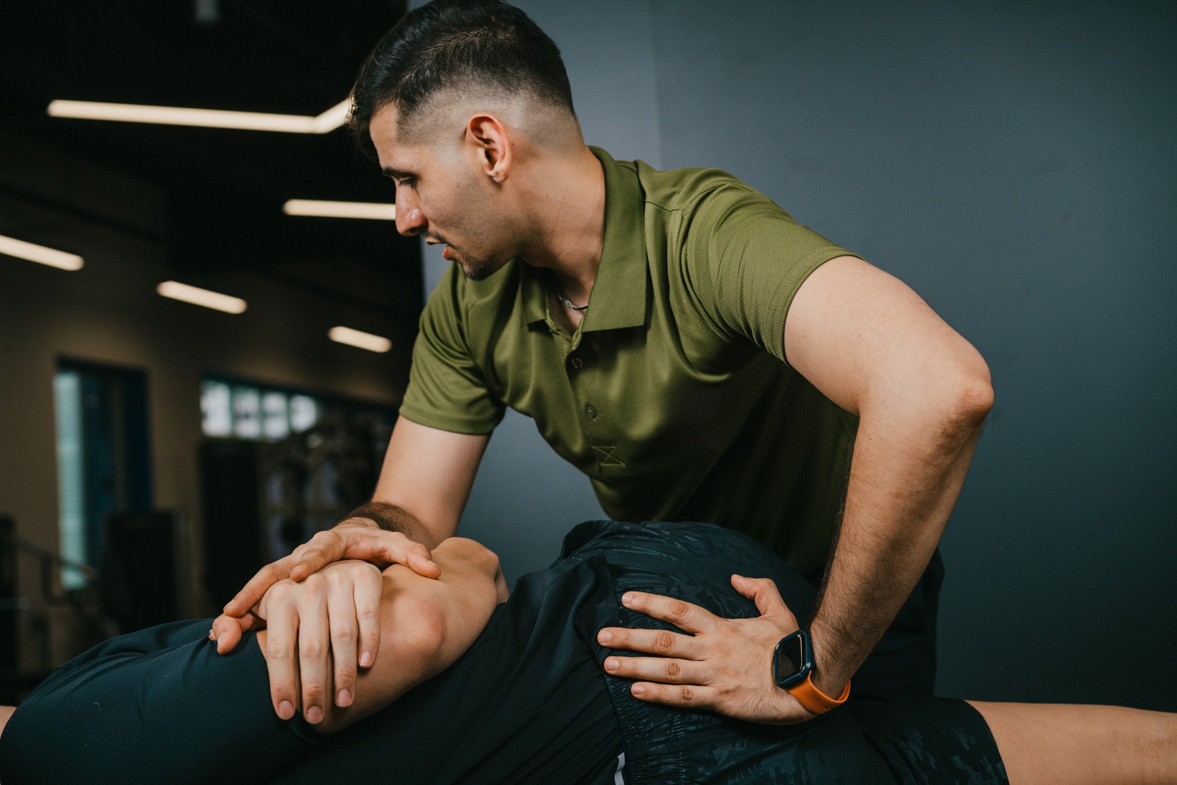 Firm soft-tissue massage work on the back at Horizon Wellness Club