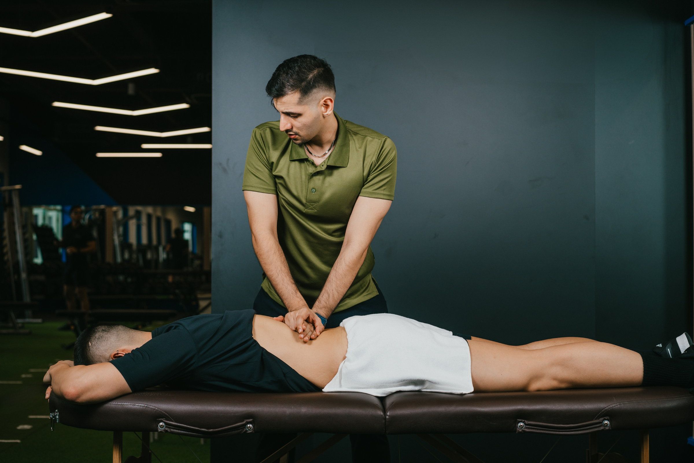 Hands-on treatment on the table at Horizon Wellness Club