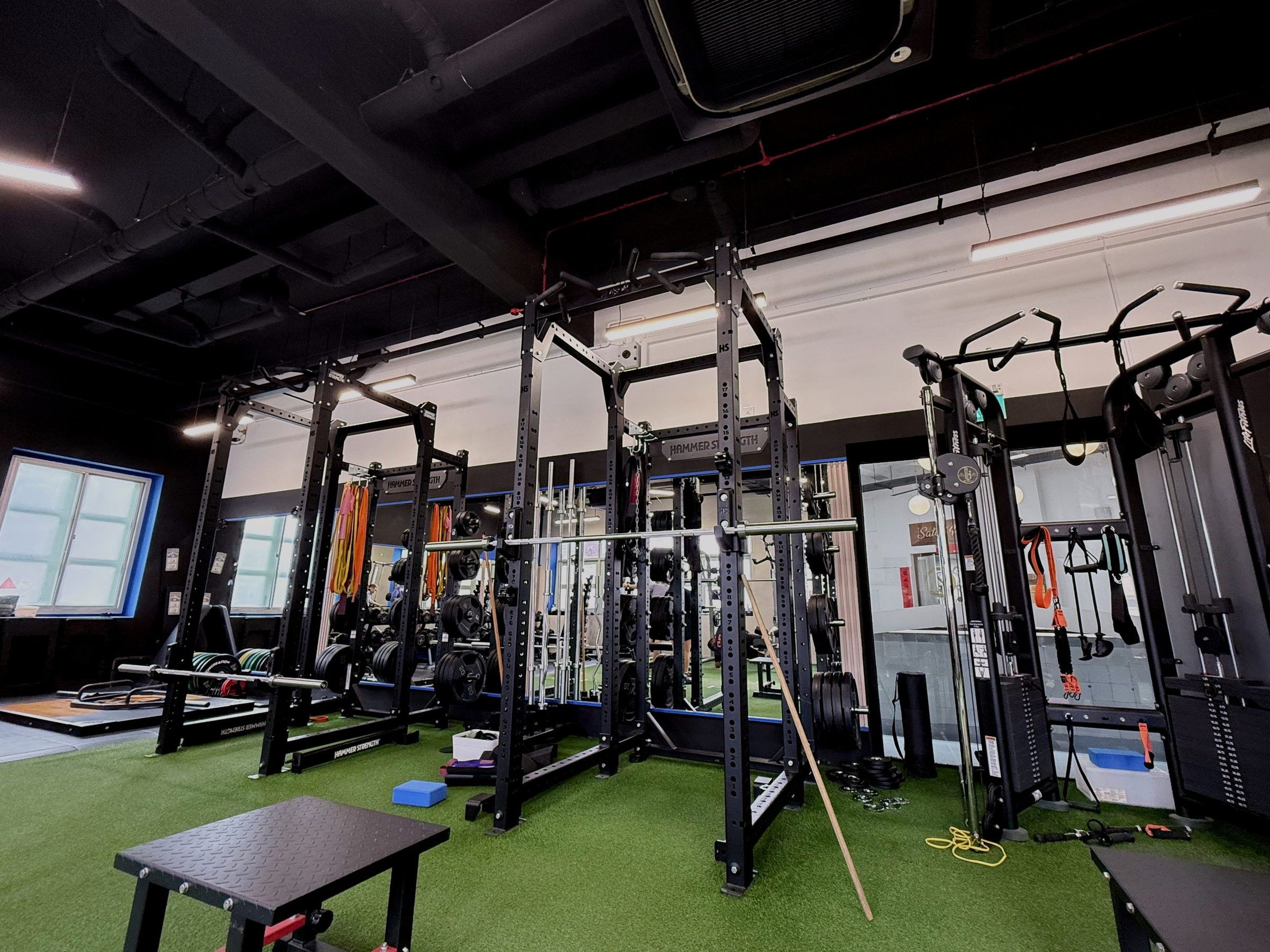 Power racks and the strength zone on the Horizon gym floor